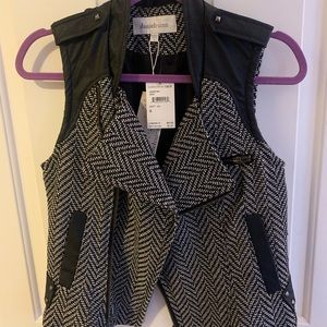 Black and white vest